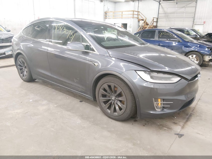 2018 Tesla Model x VIN 5YJXCDE22JF136995 IAAI salvage auction — NORMAL WEAR, Clear (Minnesota), sold $5,500 on 2026-07-14 (photo 1)
