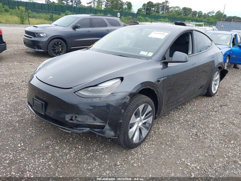 2024 Tesla Model y VIN 7SAYGDEE1RA273618 IAAI salvage auction — FRONT & REAR, Mv-907A (New York), sold $9,100 on 2026-07-09 (photo 2)
