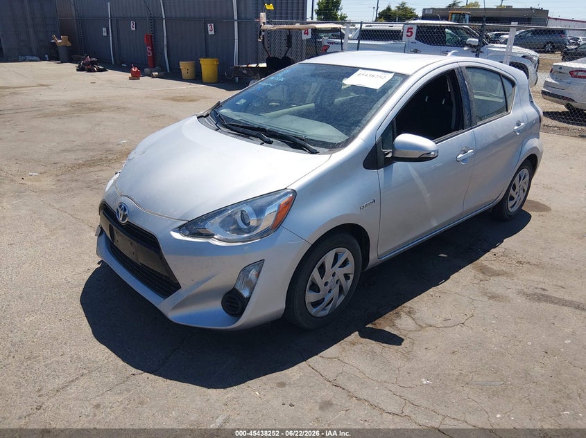 2015 Toyota Prius c VIN JTDKDTB3XF1585923 IAAI salvage auction — SIDE, Salvage (California), sold $3,250 on 2026-07-15 (photo 2)