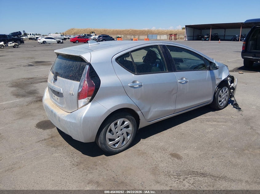 2015 Toyota Prius c VIN JTDKDTB3XF1585923 IAAI salvage auction — SIDE, Salvage (California), sold $3,250 on 2026-07-15 (photo 4)