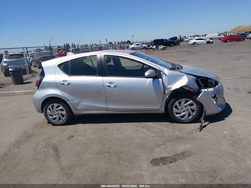 2015 Toyota Prius c VIN JTDKDTB3XF1585923 IAAI salvage auction — SIDE, Salvage (California), sold $3,250 on 2026-07-15 (photo 6)
