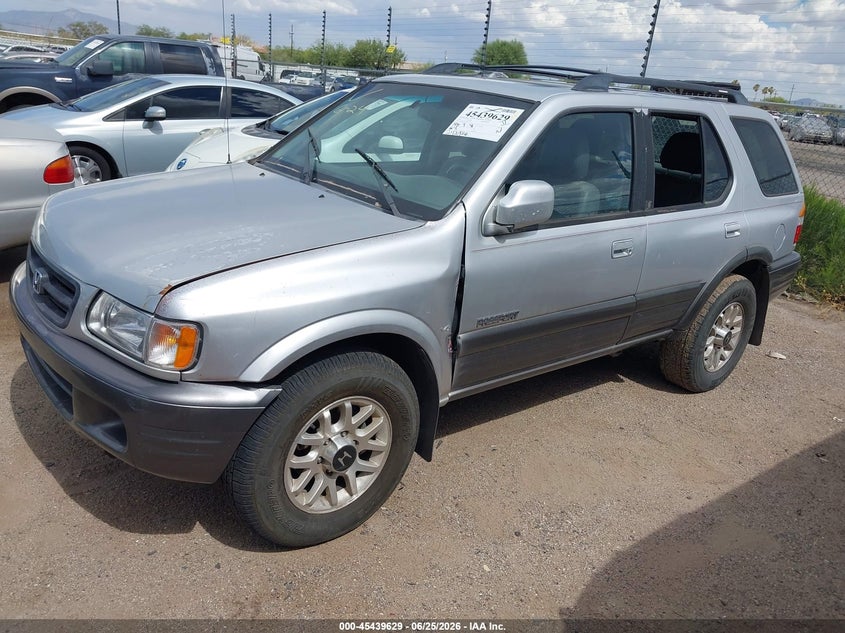 2000 Honda Passport VIN 4S6DM58W4Y4407628 IAAI salvage auction — NORMAL WEAR, Restored (Arizona), sold $250 on 2026-07-09 (photo 2)