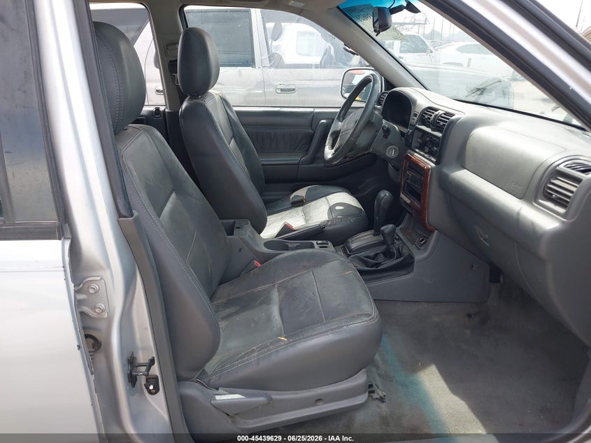 2000 Honda Passport VIN 4S6DM58W4Y4407628 IAAI salvage auction — NORMAL WEAR, Restored (Arizona), sold $250 on 2026-07-09 (photo 5)