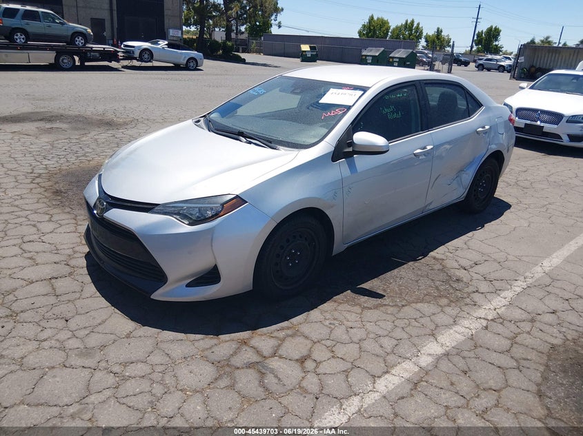 2017 Toyota Corolla VIN 5YFBURHE8HP601367 IAAI salvage auction — SIDE, Salvage (California), sold $3,150 on 2026-07-29 (photo 2)
