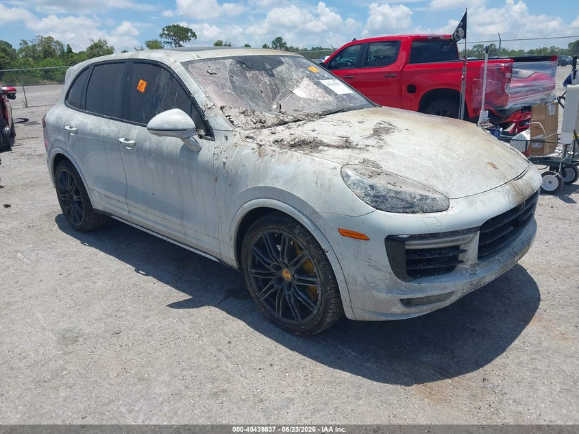 2017 Porsche Cayenne VIN WP1AC2A23HLA97257 IAAI salvage auction — BIO HAZARD, Salvage Title, sold $2,550 on 2026-07-23 (photo 1)
