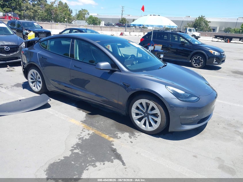2022 Tesla Model 3 VIN 5YJ3E1EA9NF295145 IAAI salvage auction — REAR END, Salvage Title, sold $5,600 on 2026-07-20 (photo 1)