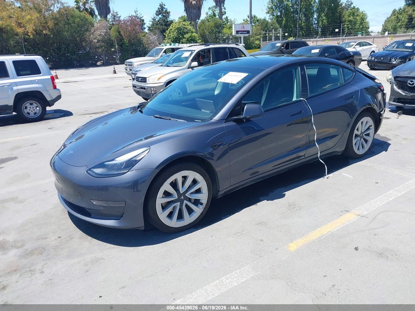2022 Tesla Model 3 VIN 5YJ3E1EA9NF295145 IAAI salvage auction — REAR END, Salvage Title, sold $5,600 on 2026-07-20 (photo 2)
