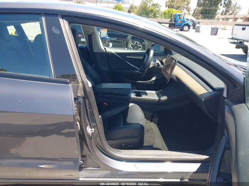 2022 Tesla Model 3 VIN 5YJ3E1EA9NF295145 IAAI salvage auction — REAR END, Salvage Title, sold $5,600 on 2026-07-20 (photo 5)