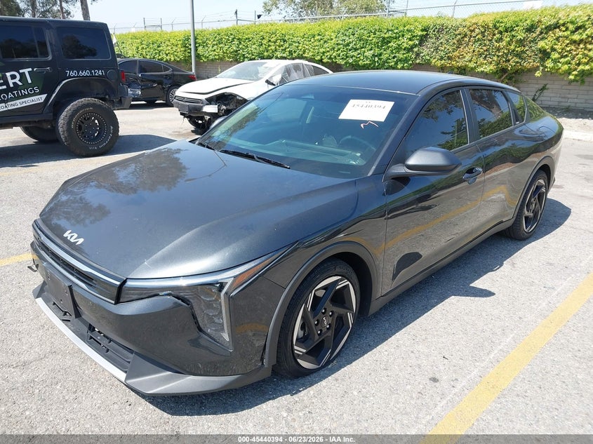 2025 Kia K4 VIN 3KPFU4DE8SE053289 IAAI salvage auction — SIDE, Salvage Title, sold $4,575 on 2026-10-07 (photo 2)