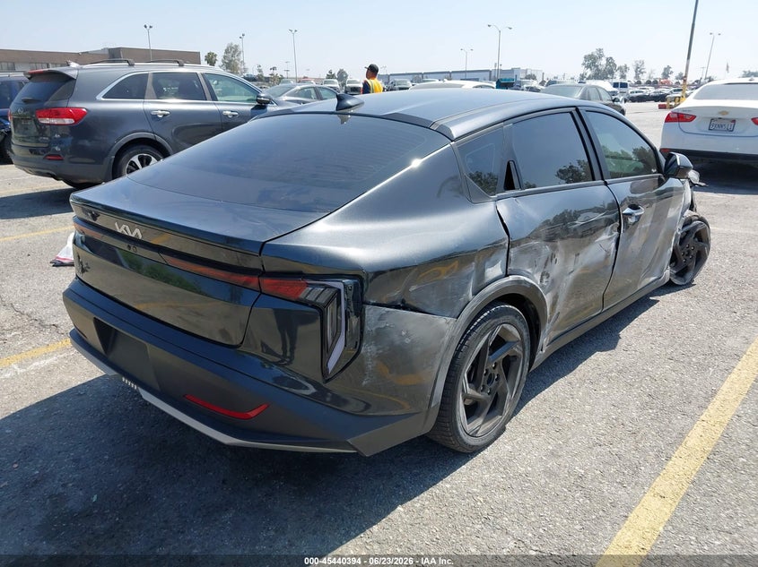 2025 Kia K4 VIN 3KPFU4DE8SE053289 IAAI salvage auction — SIDE, Salvage Title, sold $4,575 on 2026-10-07 (photo 4)
