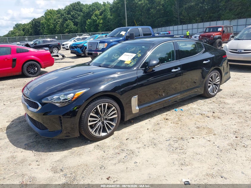 2018 Kia Stinger VIN KNAE25LA5J6012190 IAAI salvage auction — SIDE, Salvage Title, sold $4,000 on 2026-08-02 (photo 2)