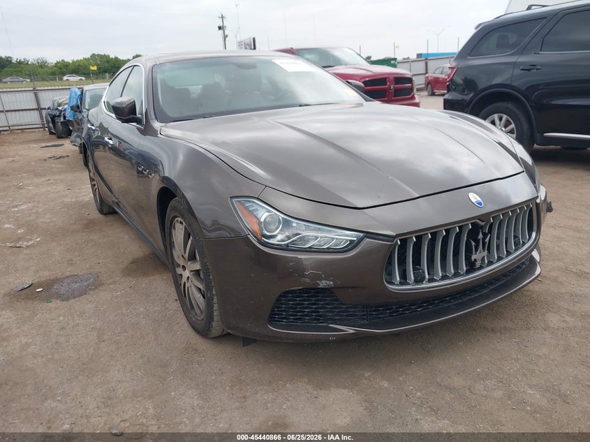2014 Maserati Ghibli VIN ZAM57RTA5E1101042 IAAI salvage auction — LEFT FRONT, Clear (Oklahoma), sold $5,025 on 2026-08-28 (photo 1)