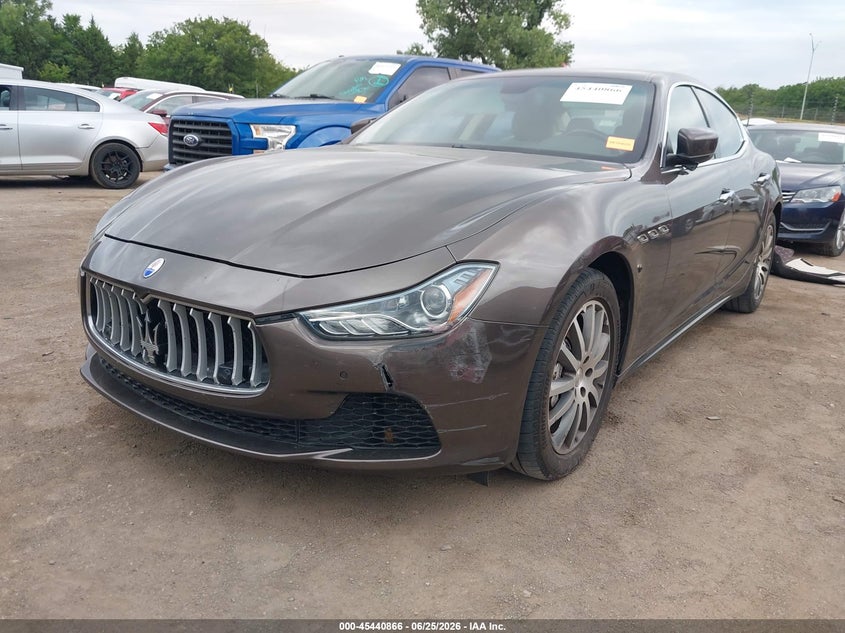 2014 Maserati Ghibli VIN ZAM57RTA5E1101042 IAAI salvage auction — LEFT FRONT, Clear (Oklahoma), sold $5,025 on 2026-08-28 (photo 2)