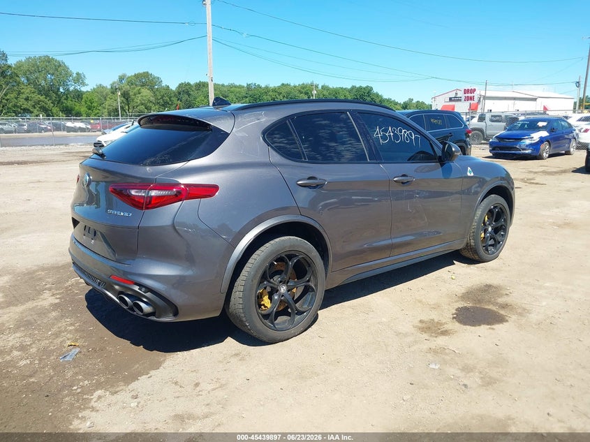 2018 Alfa romeo Stelvio VIN ZASFAKEV5J7C15476 IAAI salvage auction — STORM DAMAGE, Salvage Title, sold $10,600 on 2026-07-28 (photo 4)