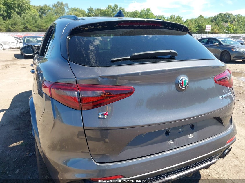 2018 Alfa romeo Stelvio VIN ZASFAKEV5J7C15476 IAAI salvage auction — STORM DAMAGE, Salvage Title, sold $10,600 on 2026-07-28 (photo 6)