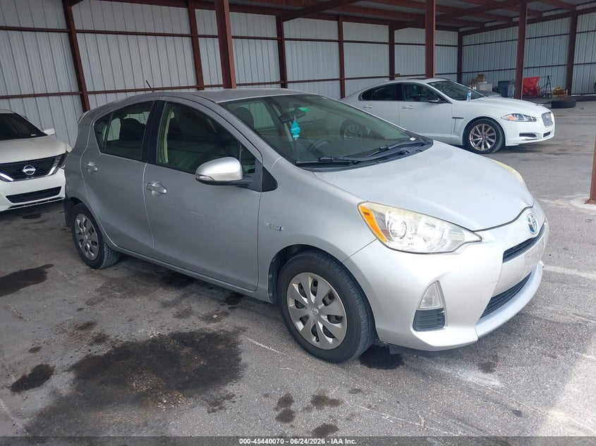 2014 Toyota Prius c VIN JTDKDTB38E1573610 IAAI salvage auction — REAR END, Rebuildable (Florida), sold $1,275 on 2026-07-29 (photo 1)