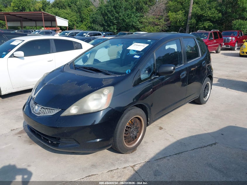 2009 Honda Fit VIN JHMGE882X9S063613 IAAI salvage auction — NORMAL WEAR, Original (Texas), sold $425 on 2026-07-20 (photo 2)
