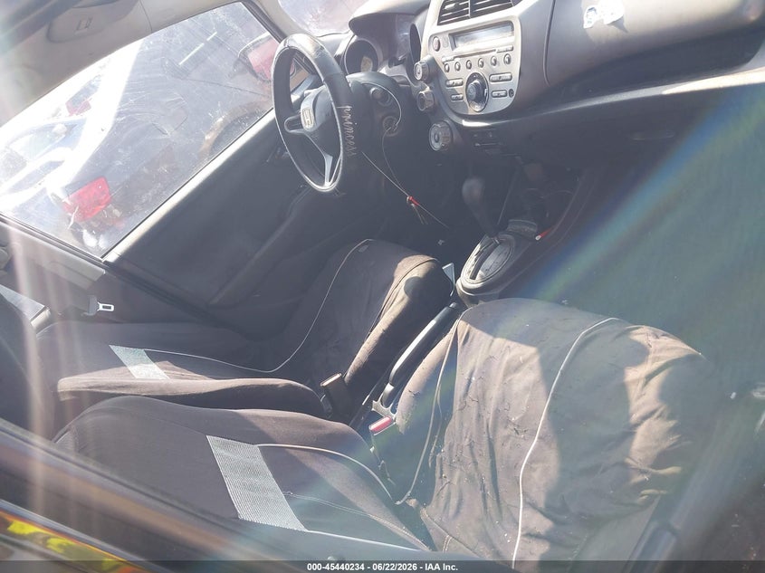 2009 Honda Fit VIN JHMGE882X9S063613 IAAI salvage auction — NORMAL WEAR, Original (Texas), sold $425 on 2026-07-20 (photo 5)