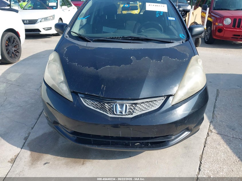 2009 Honda Fit VIN JHMGE882X9S063613 IAAI salvage auction — NORMAL WEAR, Original (Texas), sold $425 on 2026-07-20 (photo 6)