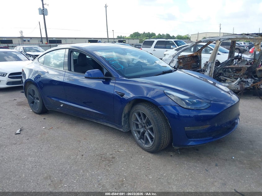 2023 Tesla Model 3 VIN 5YJ3E1EB3PF392742 — IAAI salvage auction photo
