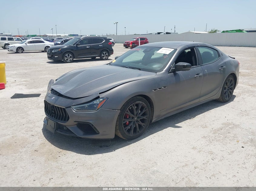 2020 Maserati Ghibli VIN ZAM57YTS9L1343767 IAAI salvage auction — FRONT & REAR, Original (Texas), sold $8,500 on 2026-08-08 (photo 2)