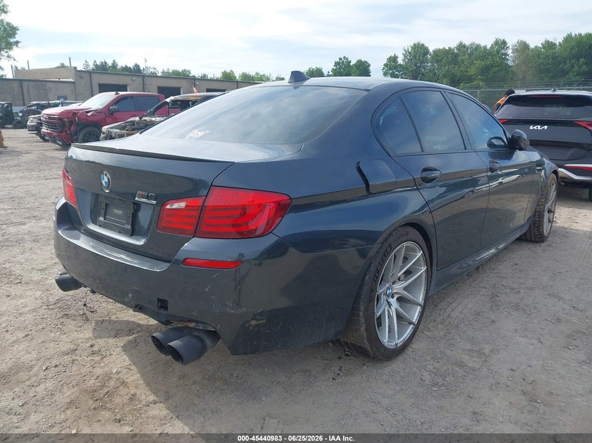 2013 BMW M5 VIN WBSFV9C56DC773964 IAAI salvage auction — REAR END, Salvage Title, sold $5,200 on 2026-07-12 (photo 4)
