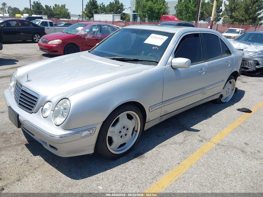 2000 Mercedes-benz E-class VIN WDBJF70J6YB117701 IAAI salvage auction — LEFT SIDE, Salvage (California), sold $475 on 2026-07-07 (photo 2)
