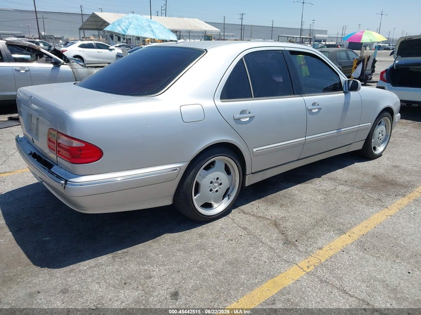 2000 Mercedes-benz E-class VIN WDBJF70J6YB117701 IAAI salvage auction — LEFT SIDE, Salvage (California), sold $475 on 2026-07-07 (photo 4)