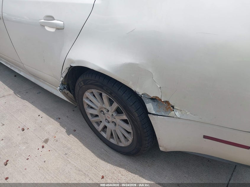 2011 Cadillac Cts VIN 1G6DE5EY3B0104051 IAAI salvage auction — LEFT SIDE, Salvage (Texas), sold $325 on 2026-07-10 (photo 6)