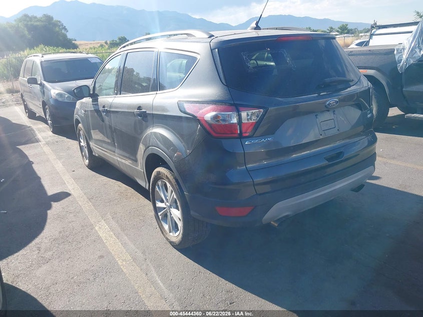 2018 Ford Escape VIN 1FMCU9GDXJUB81080 IAAI salvage auction — NORMAL WEAR, Clear (Utah), sold $2,100 on 2026-07-09 (photo 3)