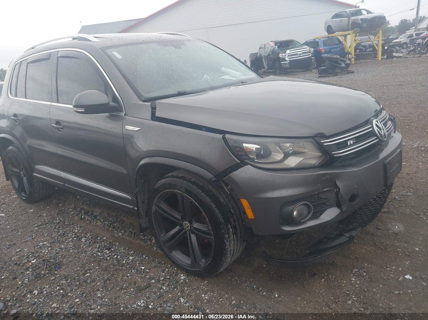 2014 Volkswagen Tiguan VIN WVGBV3AX0EW124051 IAAI salvage auction — LEFT FRONT, Salvage Title, sold $1,500 on 2026-07-29 (photo 1)