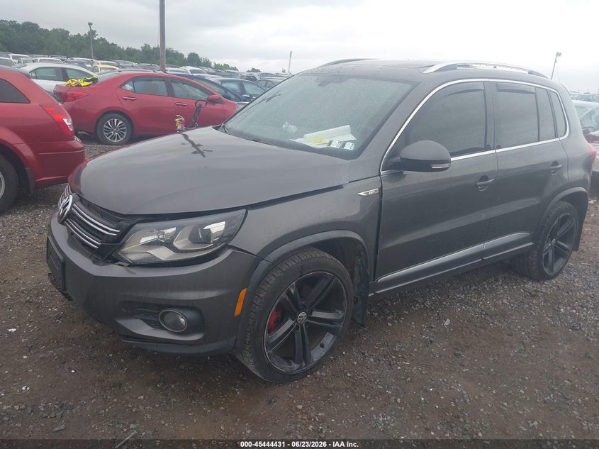 2014 Volkswagen Tiguan VIN WVGBV3AX0EW124051 IAAI salvage auction — LEFT FRONT, Salvage Title, sold $1,500 on 2026-07-29 (photo 2)
