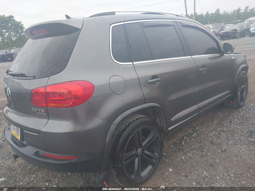 2014 Volkswagen Tiguan VIN WVGBV3AX0EW124051 IAAI salvage auction — LEFT FRONT, Salvage Title, sold $1,500 on 2026-07-29 (photo 4)