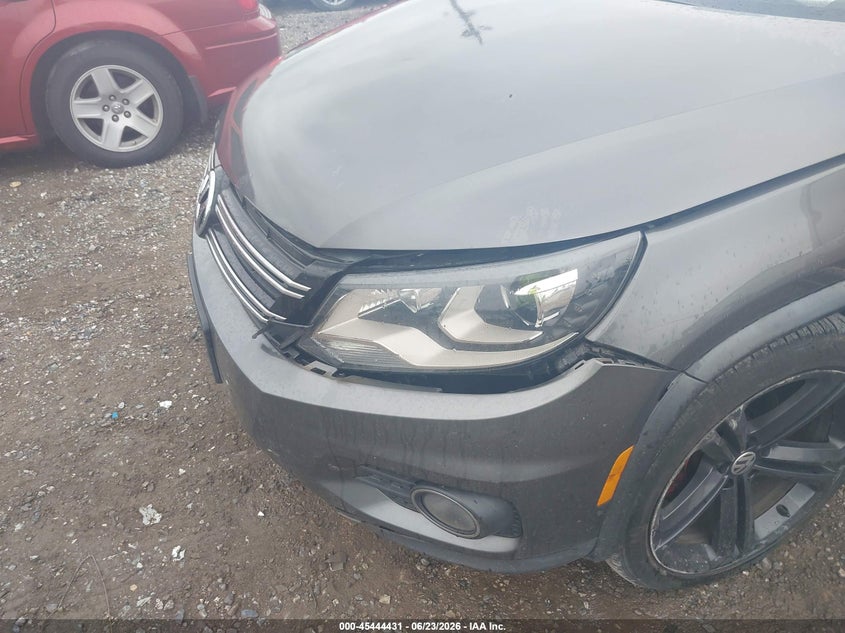 2014 Volkswagen Tiguan VIN WVGBV3AX0EW124051 IAAI salvage auction — LEFT FRONT, Salvage Title, sold $1,500 on 2026-07-29 (photo 6)
