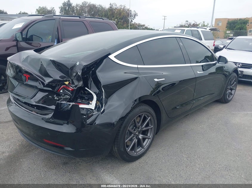 2019 Tesla Model 3 VIN 5YJ3E1EA7KF410272 IAAI salvage auction — REAR END, Salvage Title, sold $1,700 on 2026-07-23 (photo 4)