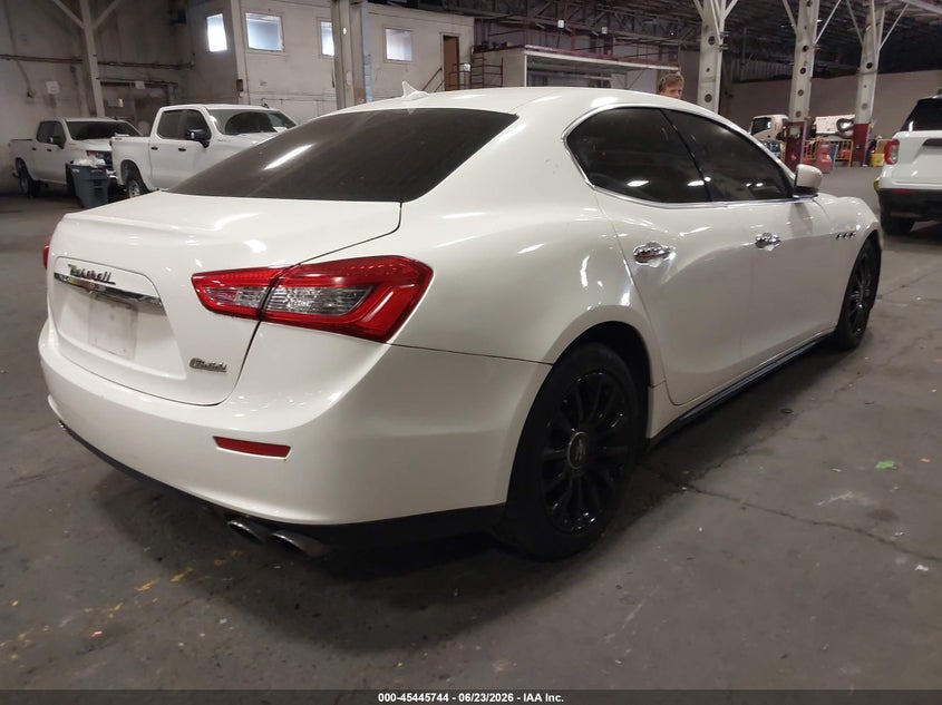 2014 Maserati Ghibli VIN ZAM57XSA5E1090095 IAAI salvage auction — NORMAL WEAR, Clear-Dealer Only (Washington), sold $2,900 on 2026-07-09 (photo 4)