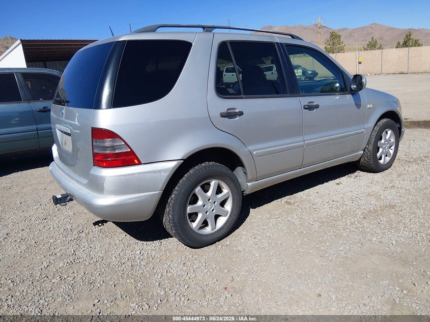 2000 Mercedes-benz Ml-class VIN 4JGAB72E1YA205697 IAAI salvage auction — NORMAL WEAR, Regular (Nevada), sold $150 on 2026-07-10 (photo 4)