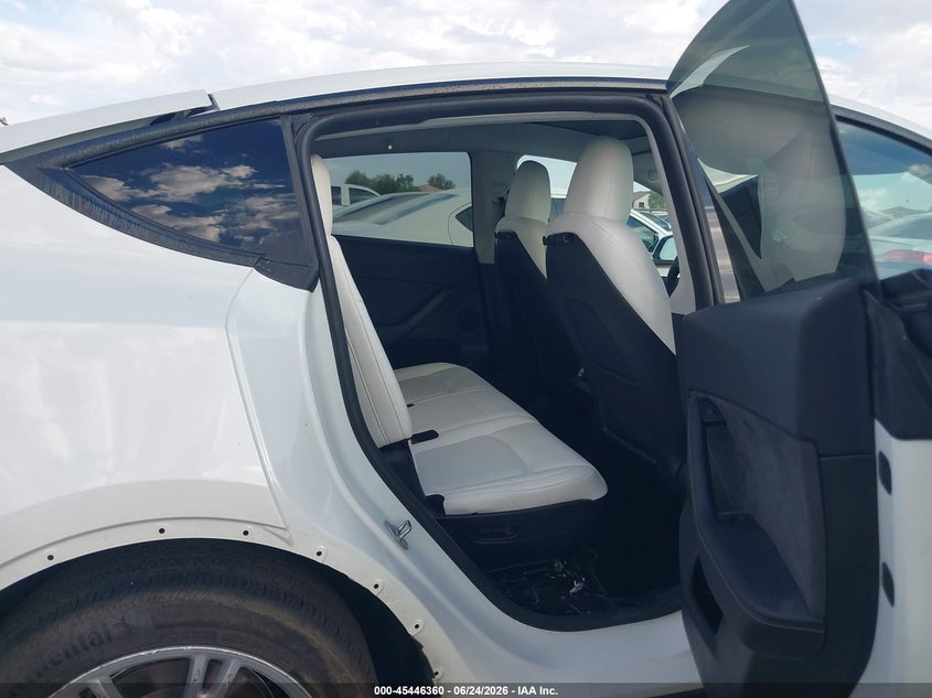 2024 Tesla Model y VIN 7SAYGAEE1RF030828 IAAI salvage auction — REAR END, Salvage Title, sold $12,600 on 2026-07-28 (photo 8)