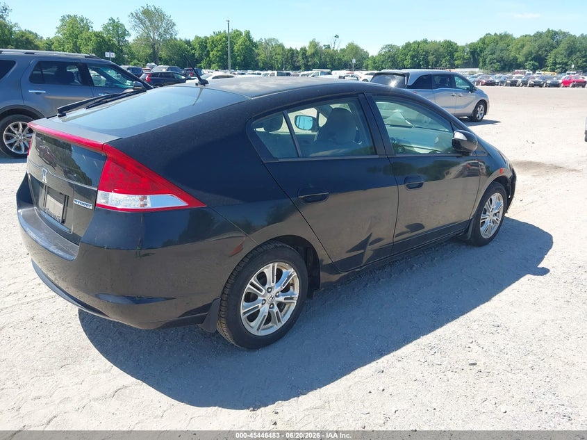 2010 Honda Insight VIN JHMZE2H74AS008712 IAAI salvage auction — NORMAL WEAR, Clear (New Jersey), sold $500 on 2026-07-28 (photo 4)