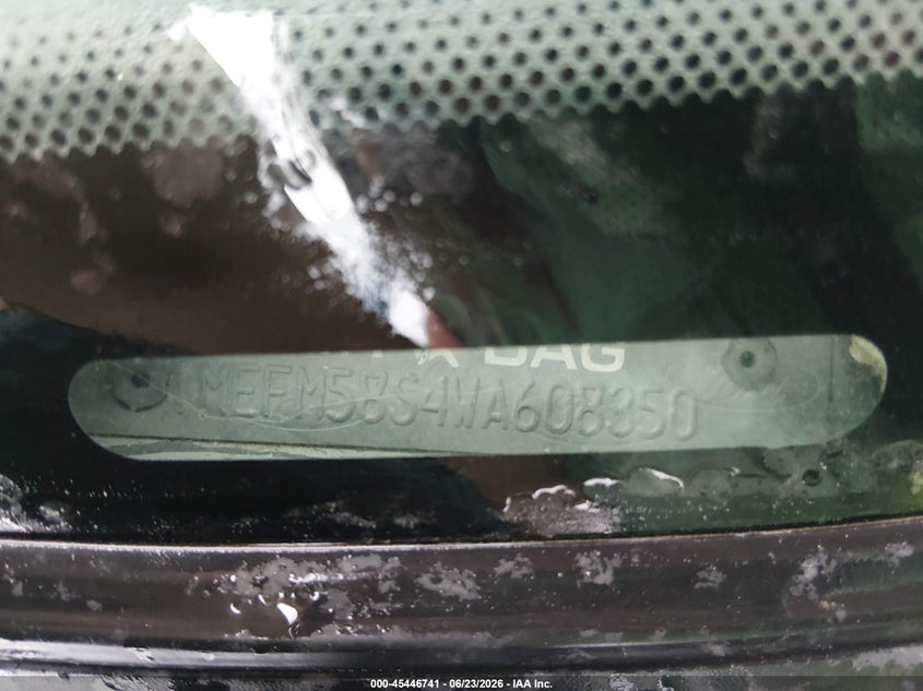 1998 Mercury Sable VIN 1MEFM58S4WA608350 IAAI salvage auction — NORMAL WEAR, Clear (Kansas), sold $250 on 2026-07-10 (photo 9)