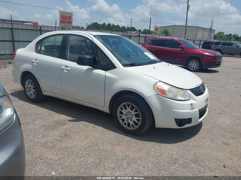 2011 Suzuki Sx4 VIN JS2YC5A2XB6302330 IAAI salvage auction — UNKNOWN, Original (Texas), sold $325 on 2026-07-29 (photo 1)