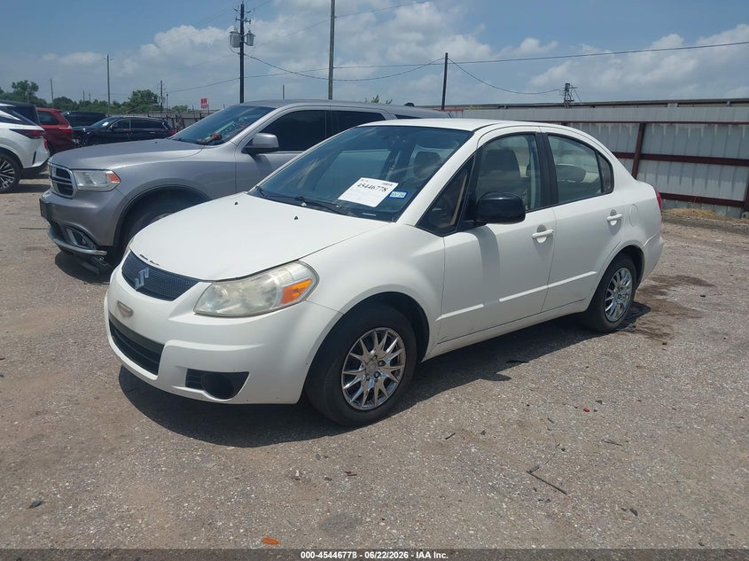2011 Suzuki Sx4 VIN JS2YC5A2XB6302330 IAAI salvage auction — UNKNOWN, Original (Texas), sold $325 on 2026-07-29 (photo 2)