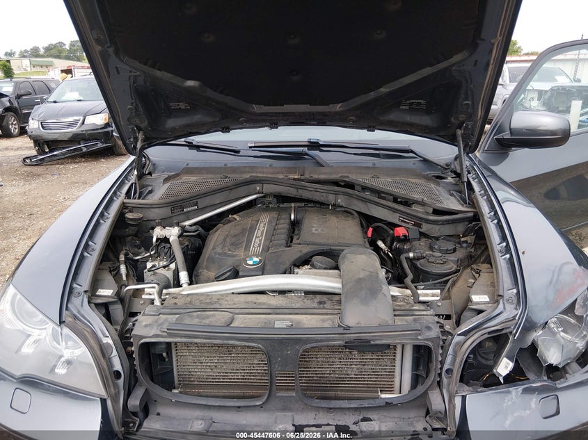 2012 BMW X5 VIN 5UXZV4C50CL991094 IAAI salvage auction — FRONT END, Clear (Arkansas), sold $425 on 2026-07-23 (photo 9)