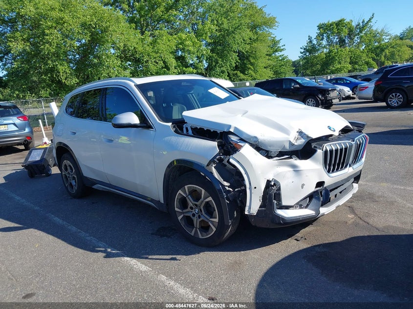 2023 BMW X1 VIN WBX73EF02P5V95282 — IAAI salvage auction photo