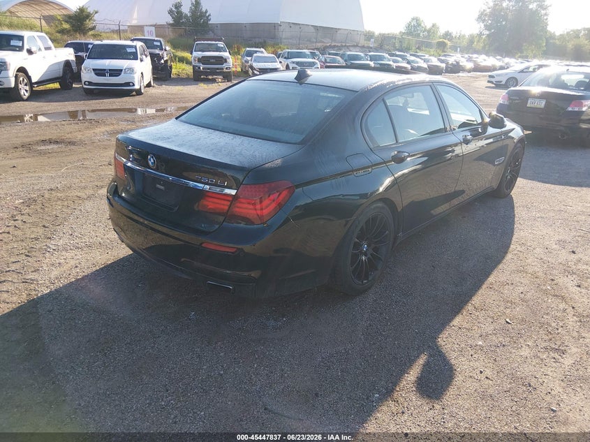 2014 BMW 7 series VIN WBAYE8C56ED135829 IAAI salvage auction — NORMAL WEAR, Clear-Dealer Only (Iowa), sold $1,550 on 2026-07-29 (photo 4)