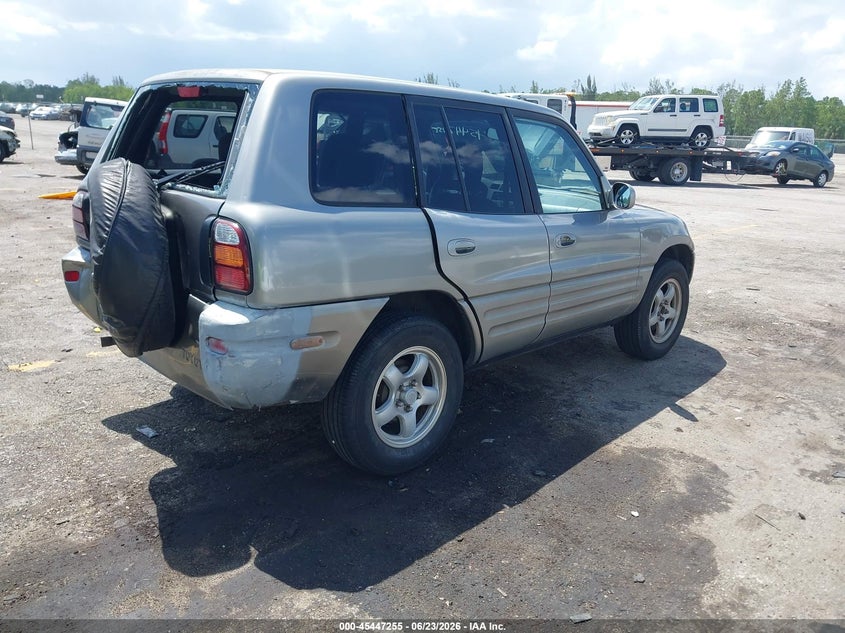 1999 Toyota Rav4 VIN JT3GP10V6X7058759 IAAI salvage auction — REAR END, Rebuildable (Florida), sold $375 on 2026-07-06 (photo 4)