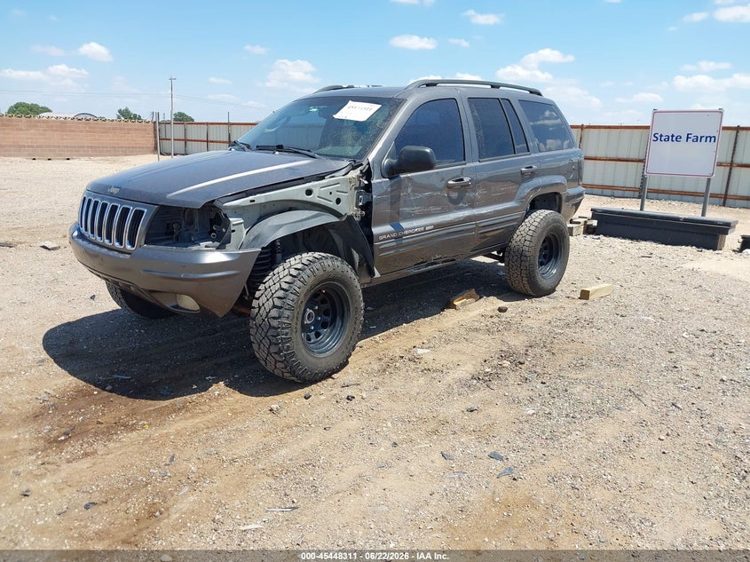 2002 Jeep Grand cherokee VIN 1J4GW58N22C111669 IAAI salvage auction — SIDE, Salvage (Texas), sold $450 on 2026-07-26 (photo 2)