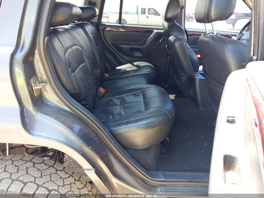 2002 Jeep Grand cherokee VIN 1J4GW58N22C111669 IAAI salvage auction — SIDE, Salvage (Texas), sold $450 on 2026-07-26 (photo 8)
