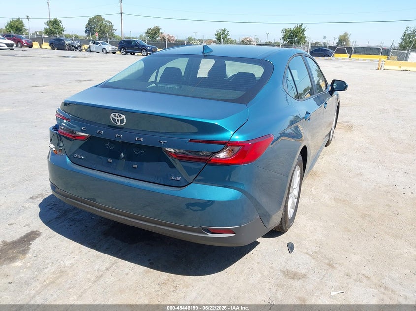 2026 Toyota Camry VIN 4T1DAACK2TU755791 IAAI salvage auction — SIDE, Salvage Title, sold $12,600 on 2026-07-30 (photo 4)