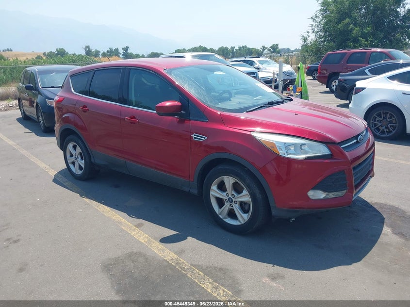 2013 Ford Escape VIN 1FMCU9GX0DUC60871 IAAI salvage auction — NORMAL WEAR, Clear (Utah), sold $1,200 on 2026-07-09 (photo 1)